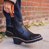 Trish Black Faux Leather Wedged Ankle Boots