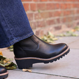 Trish Black Faux Leather Wedged Ankle Boots