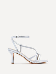 Model wearing Cassie wide fit silver strappy square toe heels