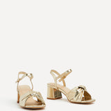 Charlotte Gold Faux Leather Knotted Heels