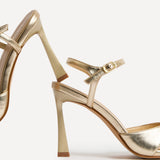 Compelled Gold Stiletto Heeled Sandals