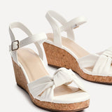 Elyah White Faux Leather Cork Wedges