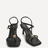 Immersed Black Heeled Sandals
