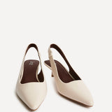 Reign Nude Faux Leather Court Heels