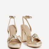 Ruba Gold Knotted Platform Heels